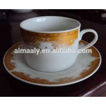porcelain cup and saucer with golden decal